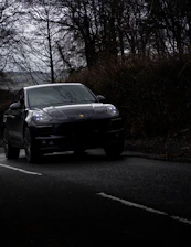 black car on road during daytime