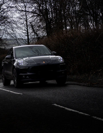 black car on road during daytime