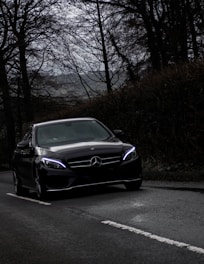 black porsche 911 parked on road