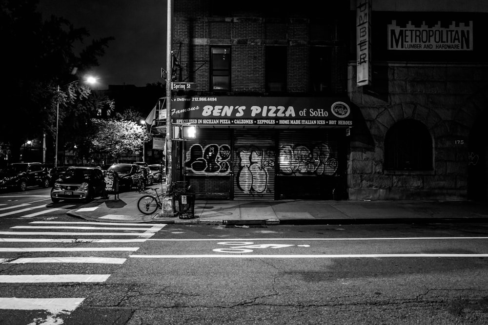 grayscale photo of a store front