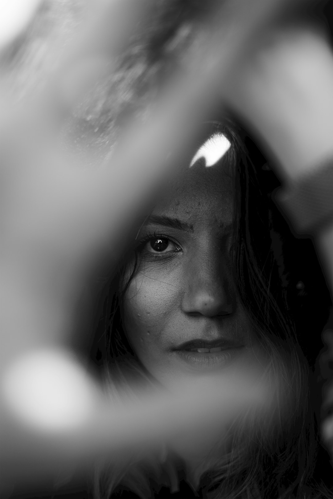 grayscale photo of womans face