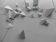 A hands-on math activity involving shapes and patterns on a table.