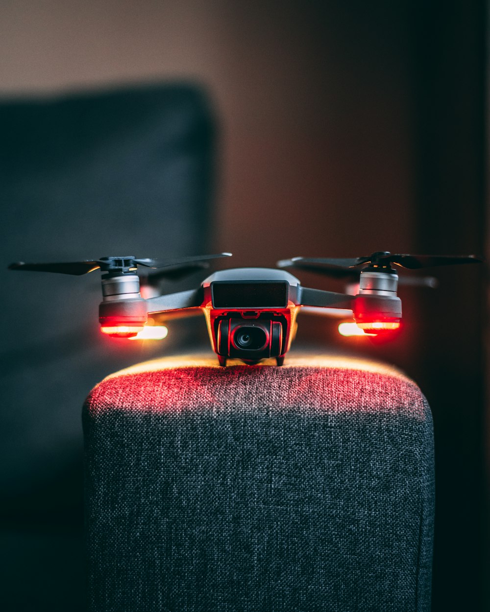 black and orange drone on brown textile