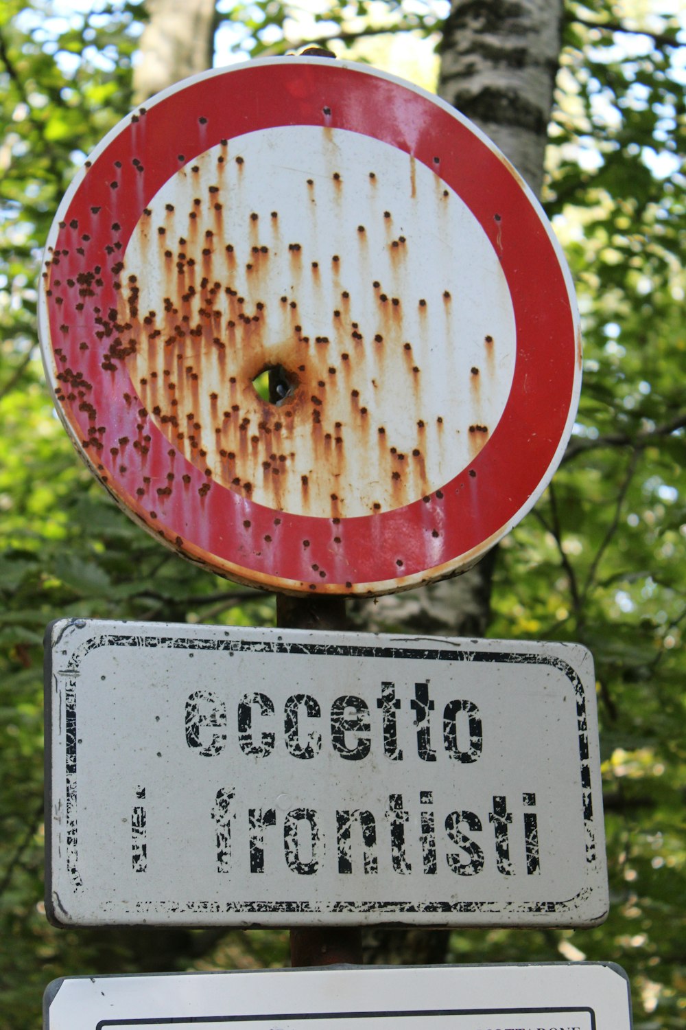 red and white round signage