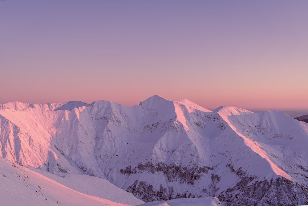 snow covered mountain during daytime