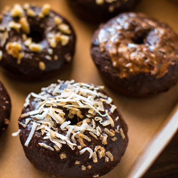 chocolate doughnut with white icing on top