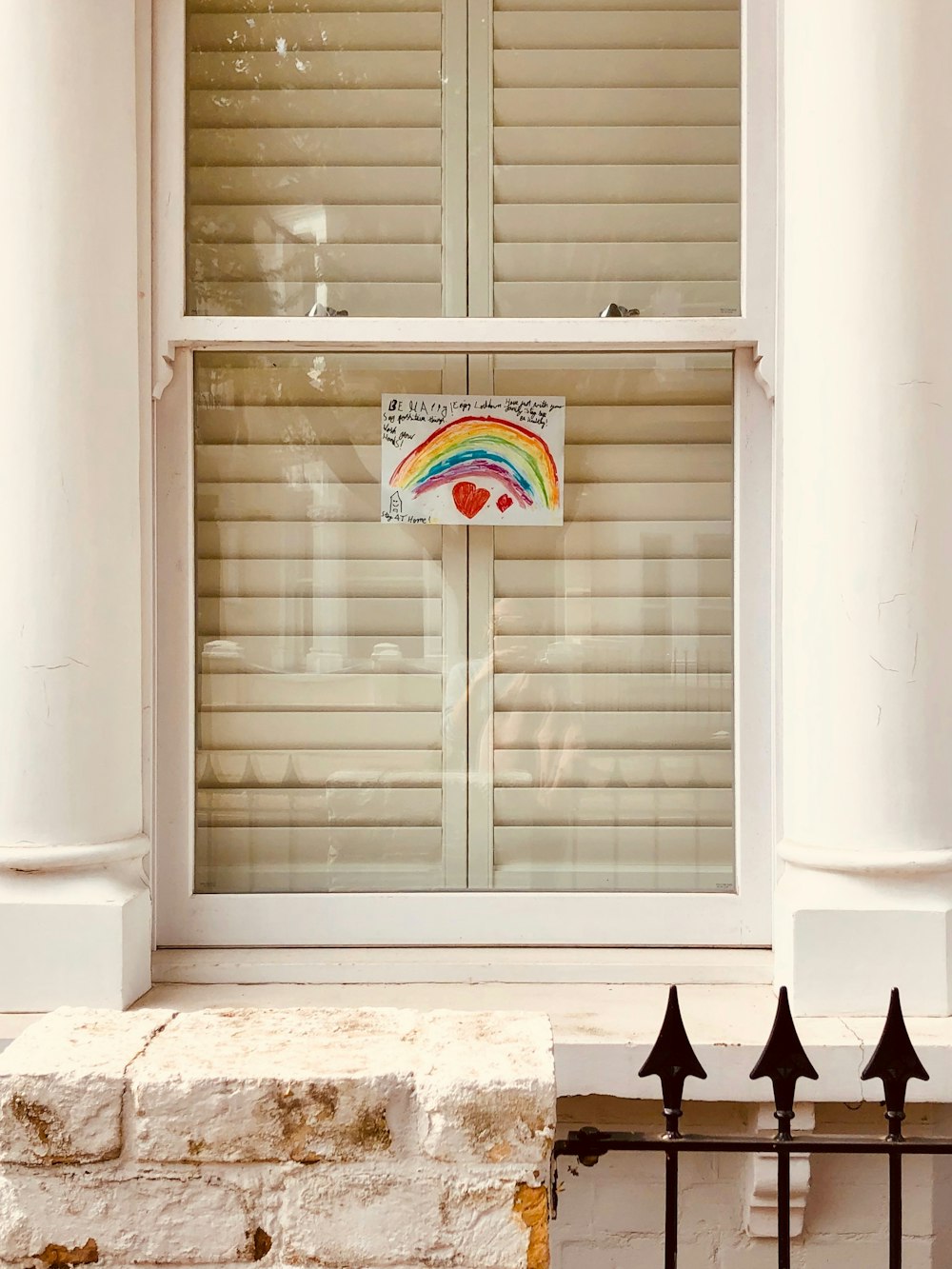 white wooden framed glass window