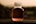 clear glass jar with brown liquid