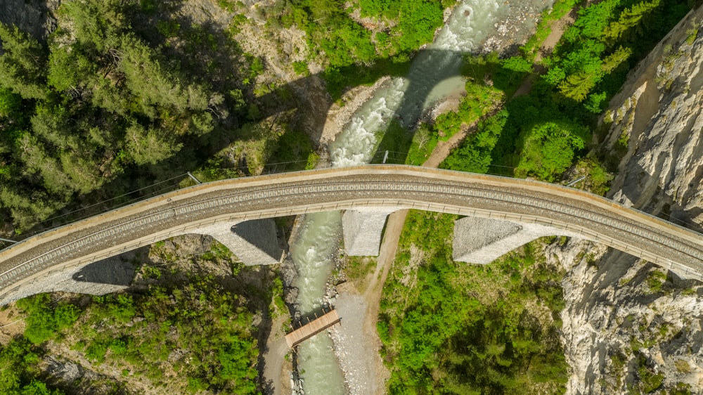 aerial view of gray concrete bridge