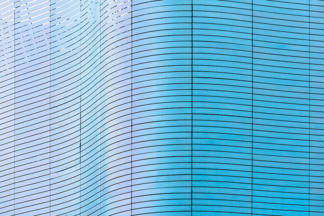 blue and white glass walled building