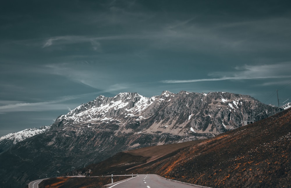 snow covered mountain under blue sky during daytime