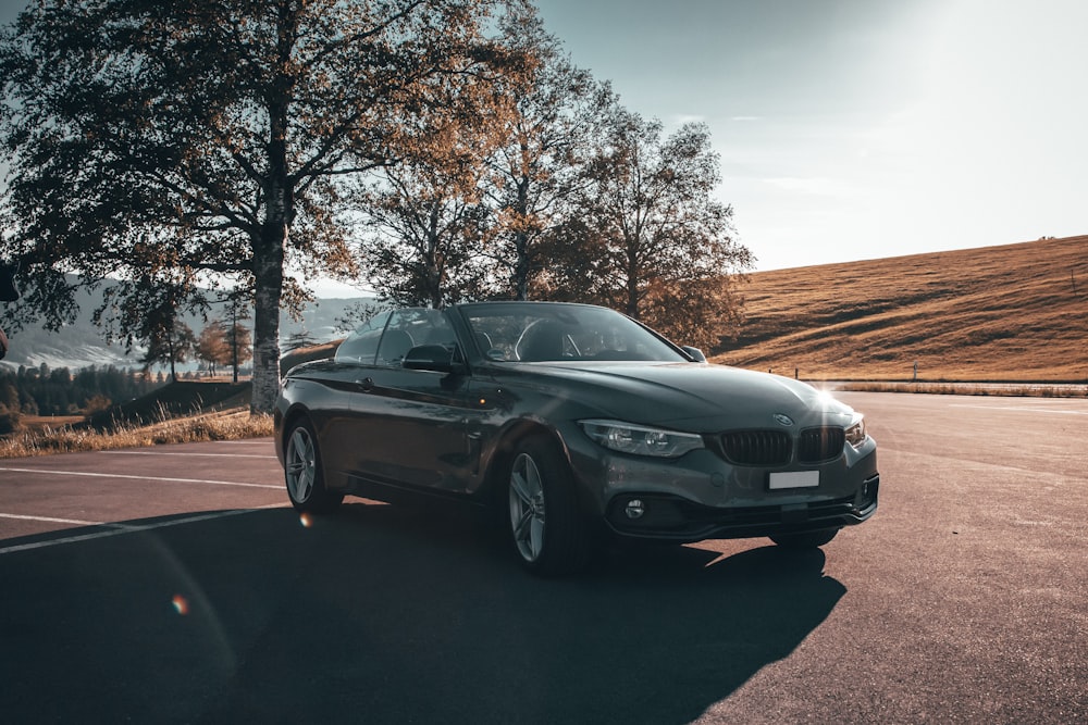 black bmw m 3 parked on road during daytime