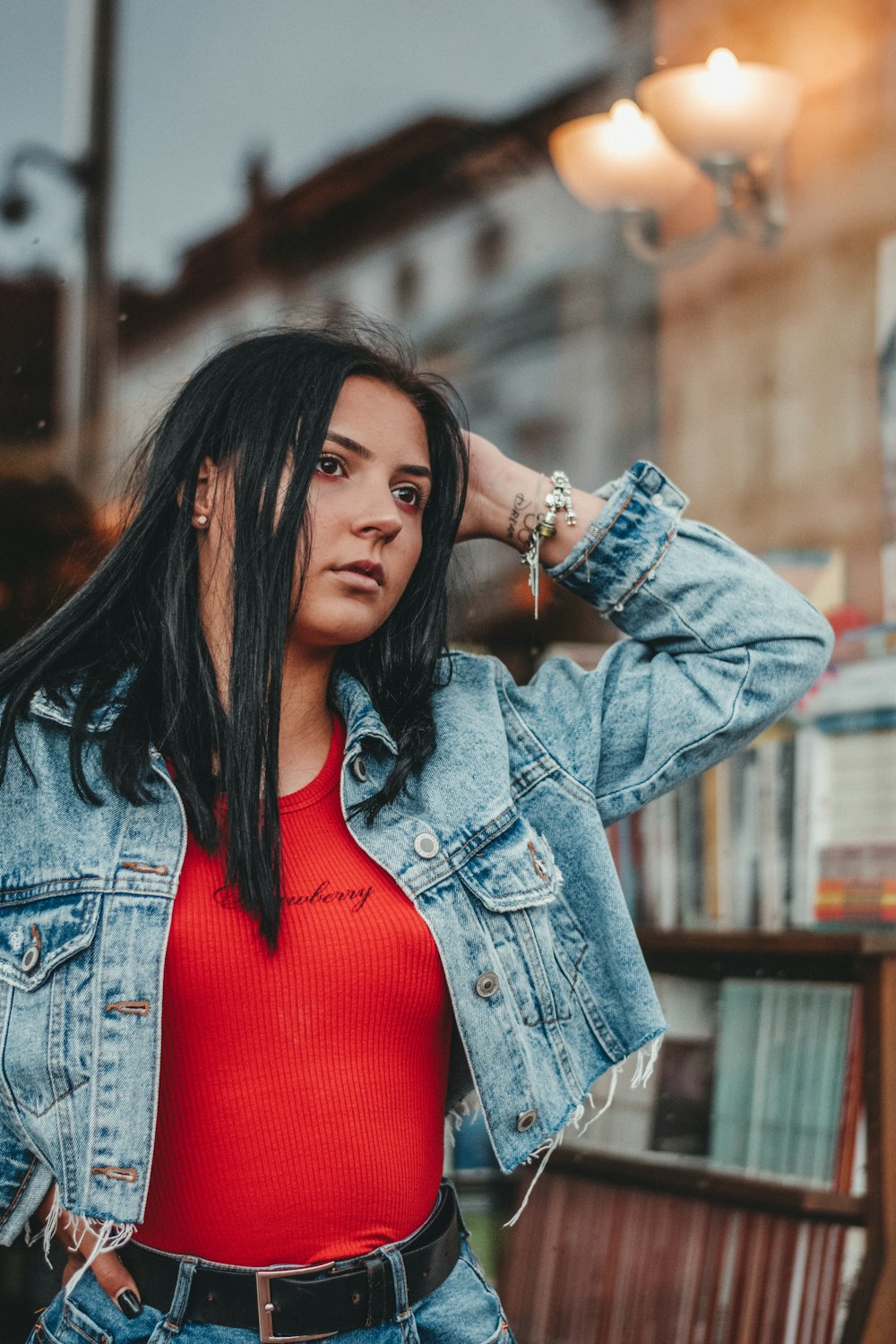 Woman in blue denim jacket and red shirt photo – Free România Image on  Unsplash