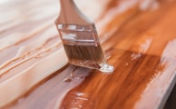 brown wooden handle brush on brown wooden table