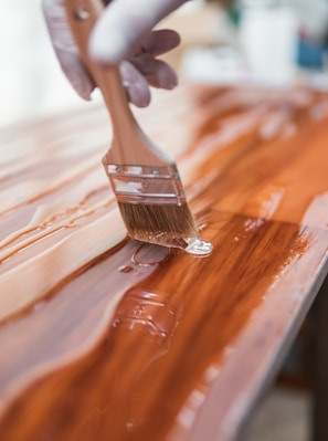 brown wooden handle brush on brown wooden table