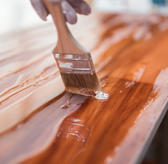 brown wooden handle brush on brown wooden table