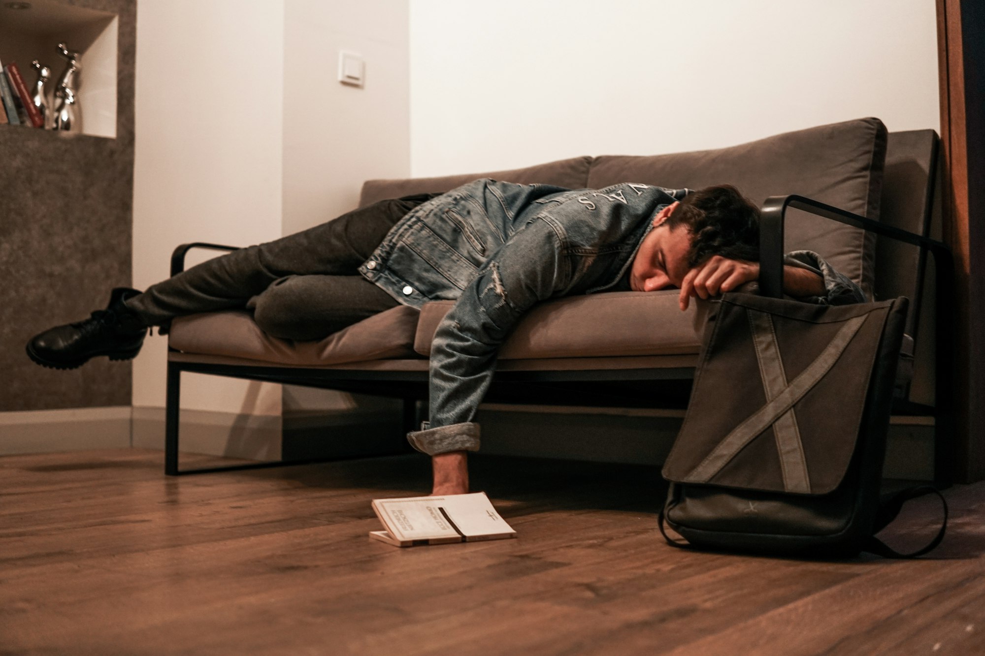 Man sleeping on a sofa - wornbee.com