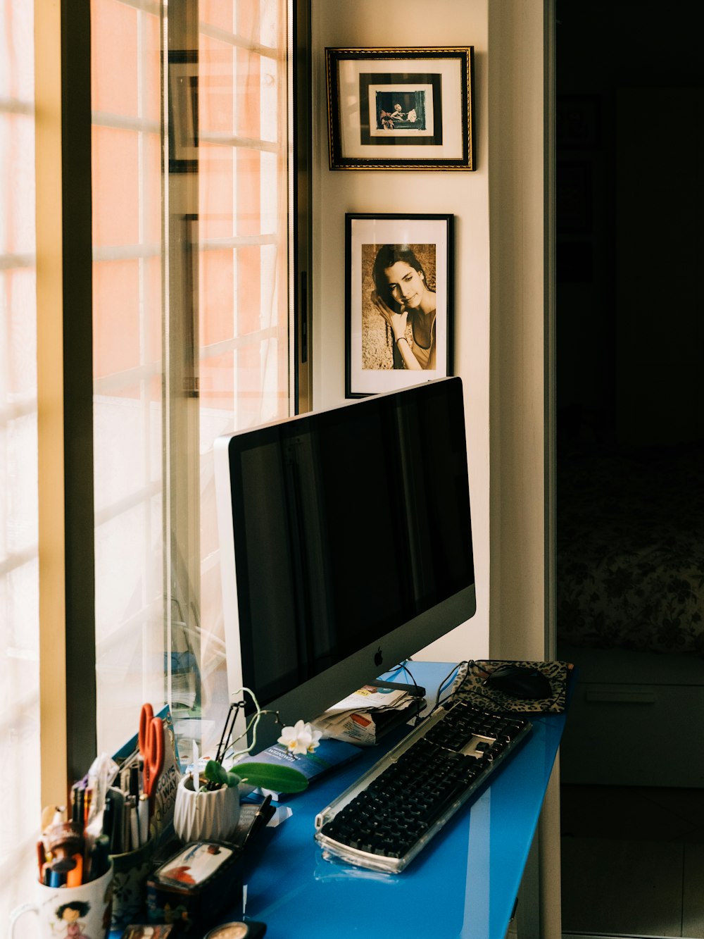 black flat screen tv on brown wooden table