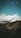 green and brown mountain under blue sky and white clouds during daytime