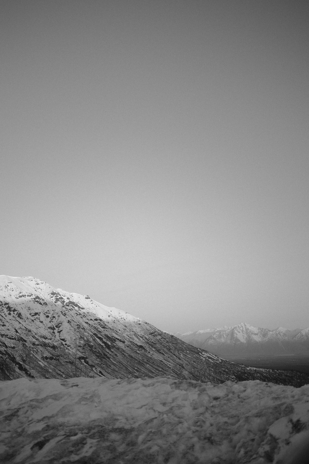 snow covered mountain during daytime