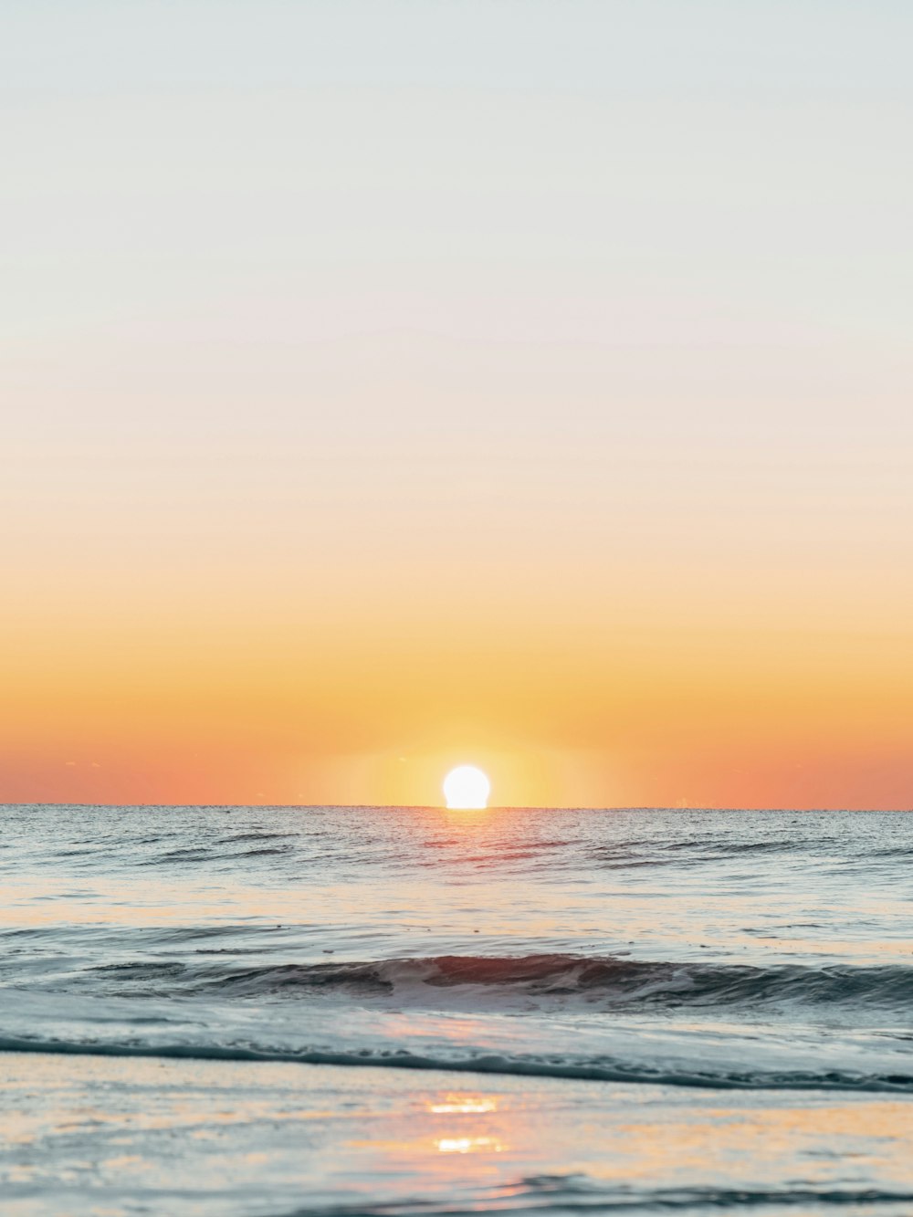 ocean waves during golden hour