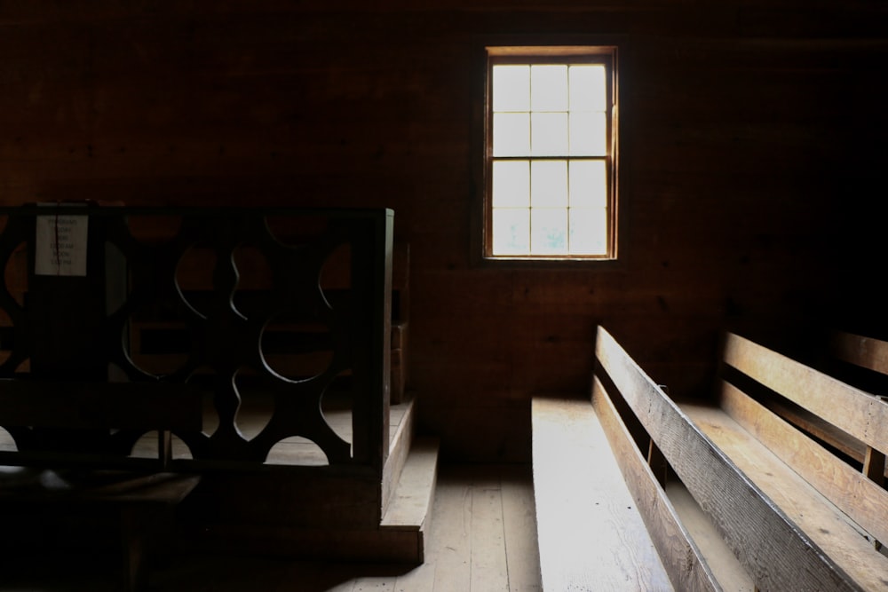 brown wooden door near white wooden table