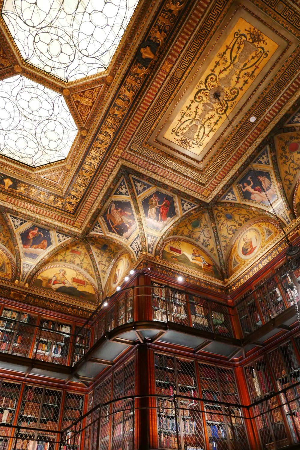 brown wooden shelves with books