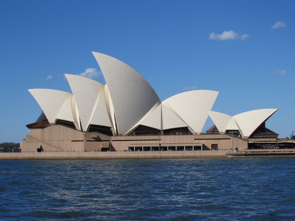 sydney opera house near body of water during daytime