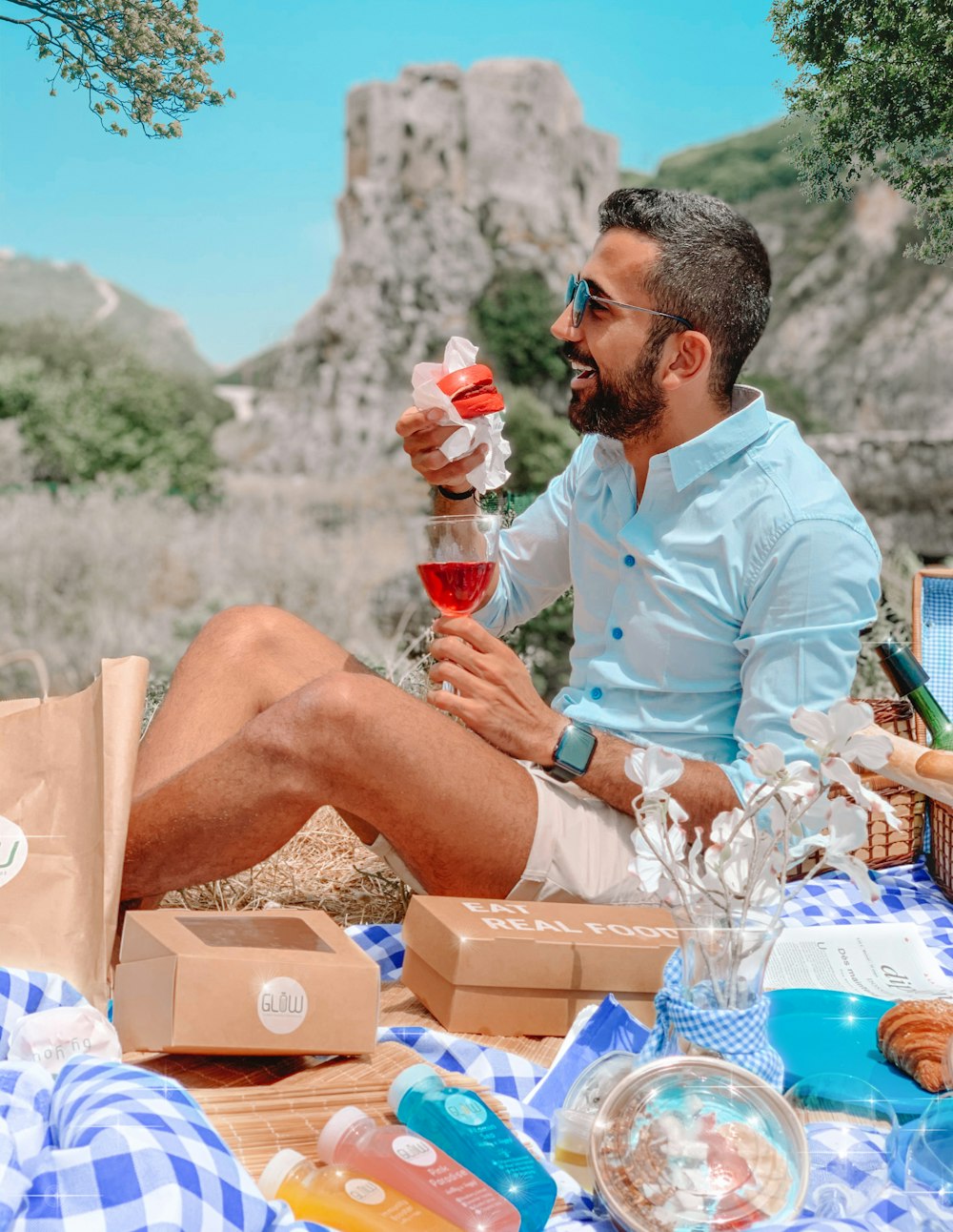 man in white dress shirt holding ice cream cone