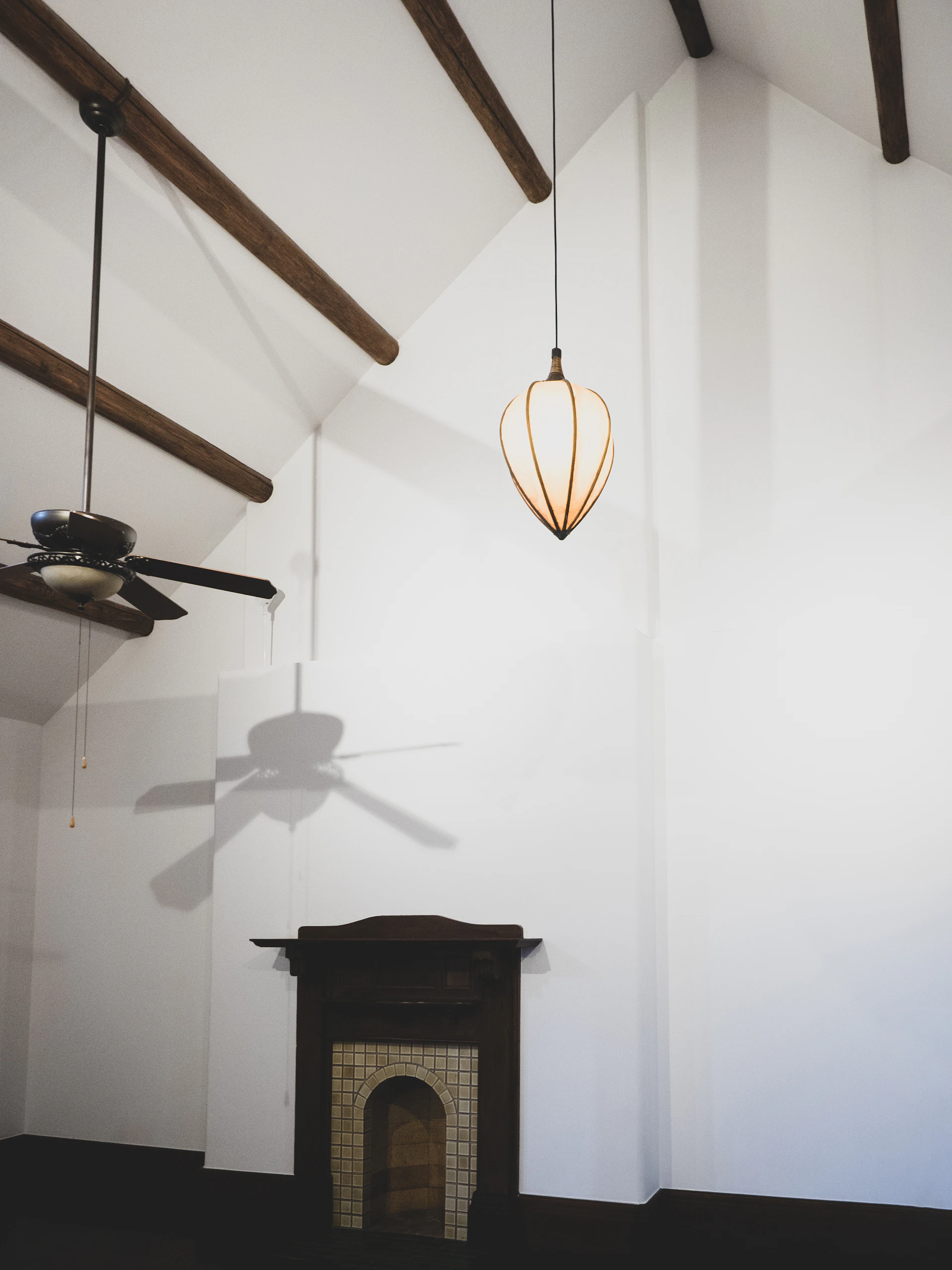 woman wearing yellow long-sleeved dress under white clouds and blue sky during daytime