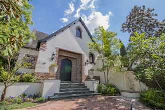 Exterior view of a freshly plastered and decorated Yorkshire house on a bright day