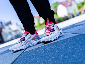 Lifestyle shot of a person wearing custom shoes and accessories outdoors