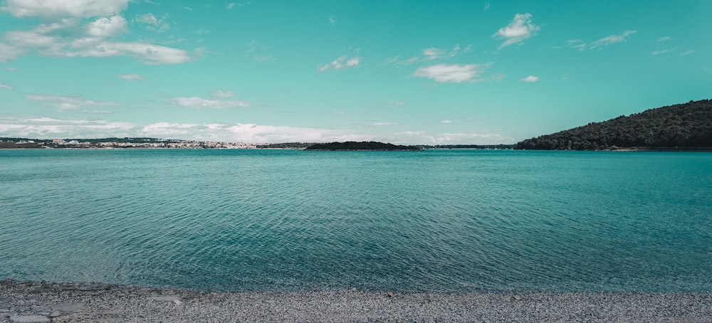 blue sea under blue sky during daytime