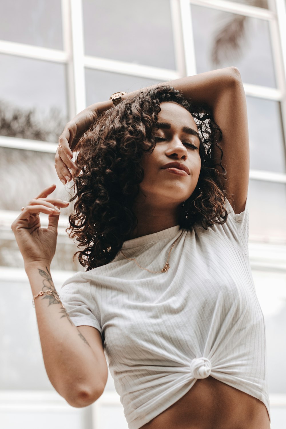 woman in white crew neck t-shirt