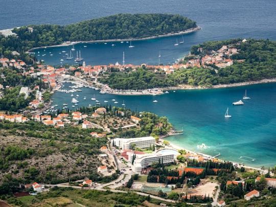 aerial view of city near body of water during daytime in Cavtat Croatia
