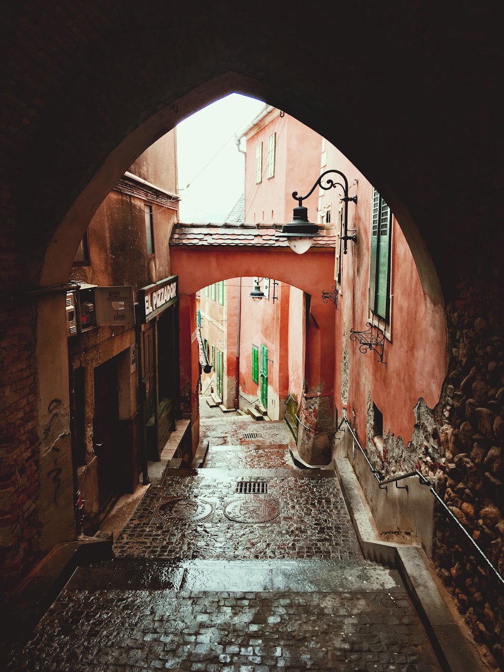 empty hallway with red brick walls