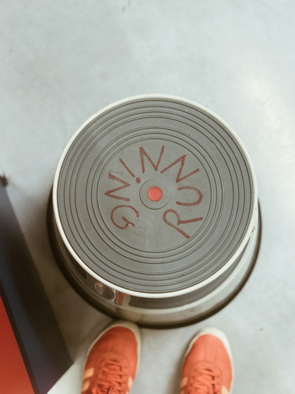 silver can on white table