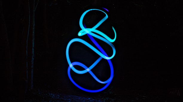 A vibrant light cyan blue background with a modern design.