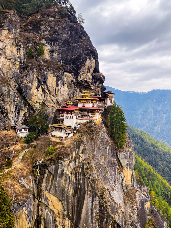 Red and white building on a mountaintop in Bhutan