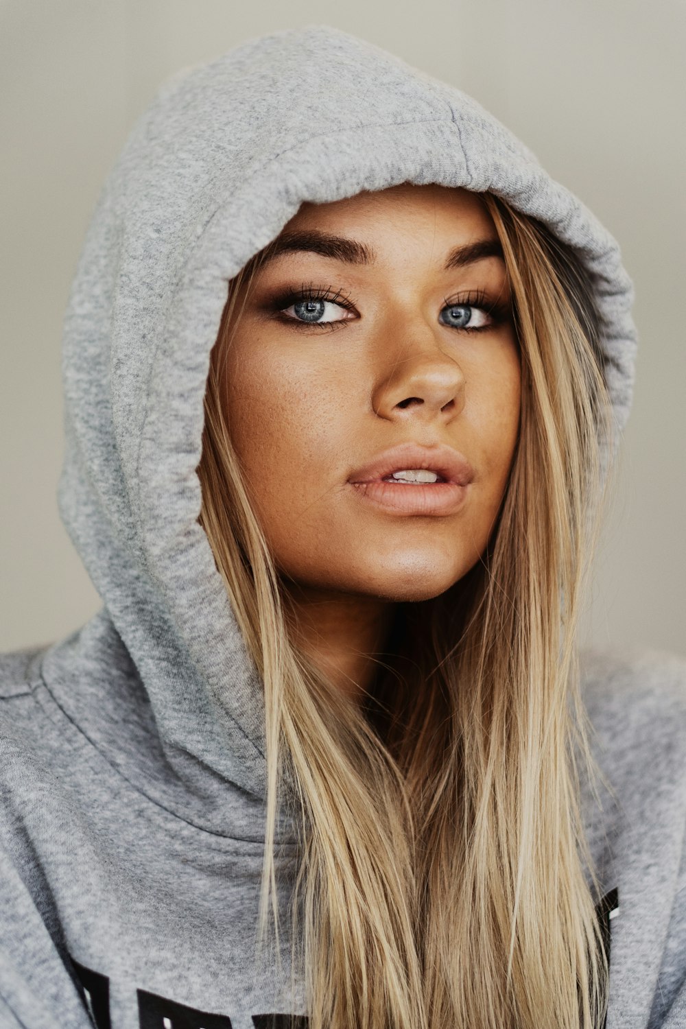 woman in gray hoodie jacket