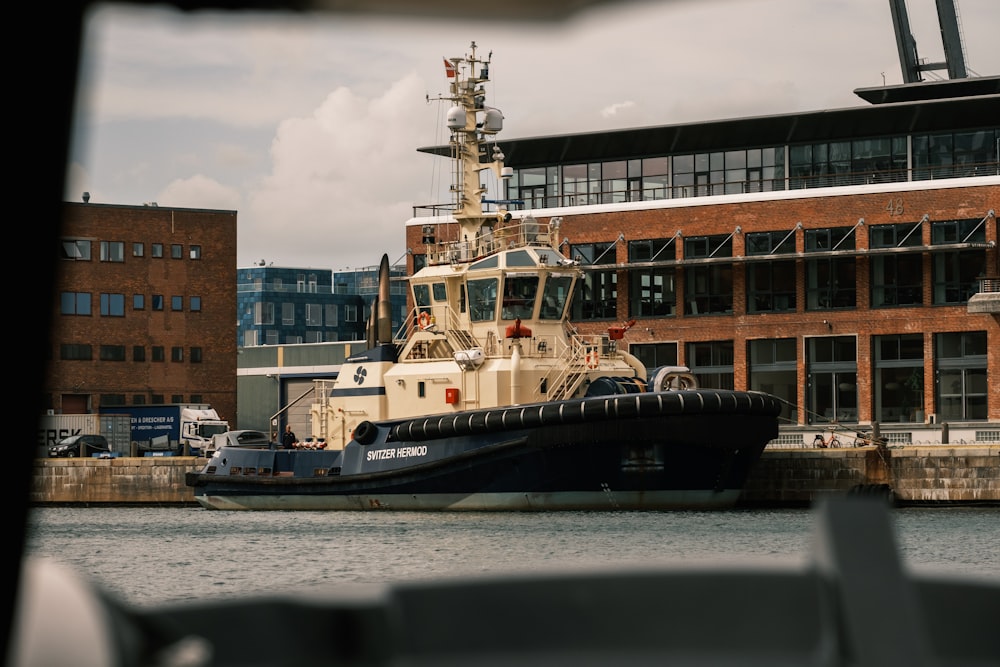 white and black ship on sea during daytime