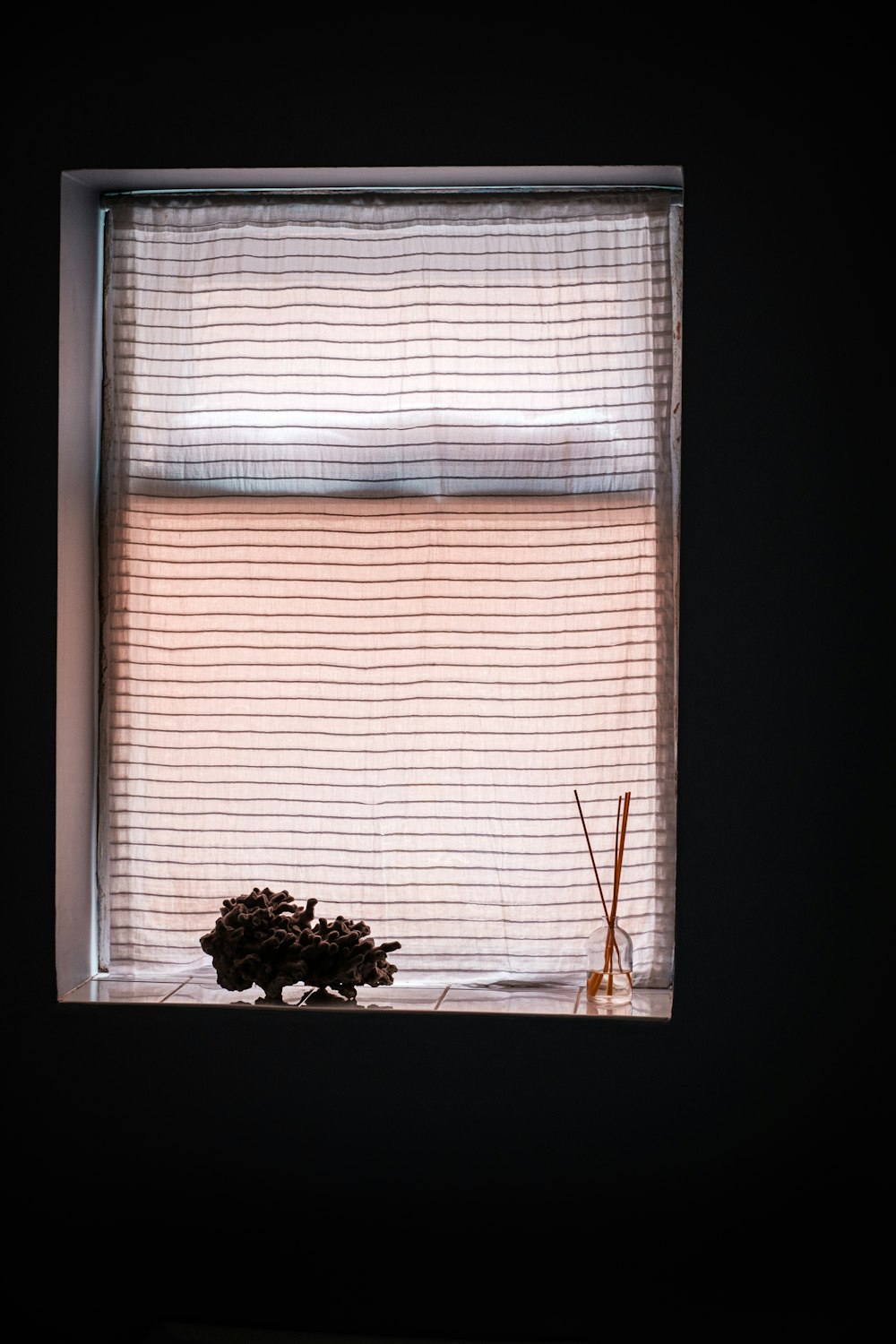 white window blinds on window