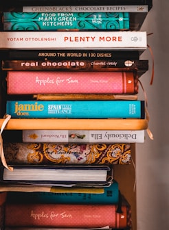 books on brown wooden shelf