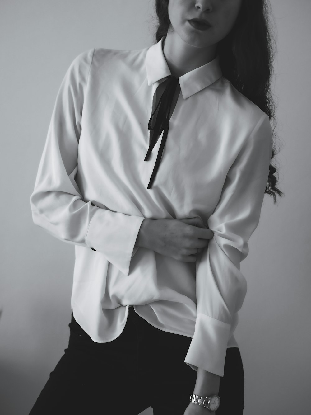 woman in white long sleeve shirt