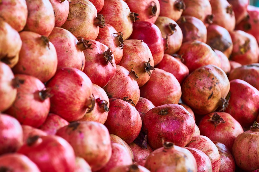 red apples on brown wooden table