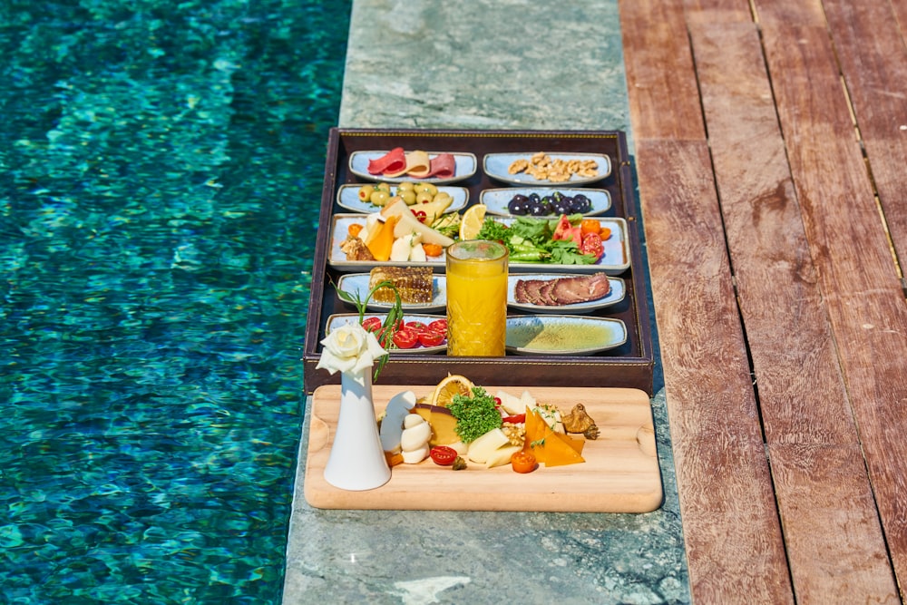 black and brown rectangular tray on brown wooden table