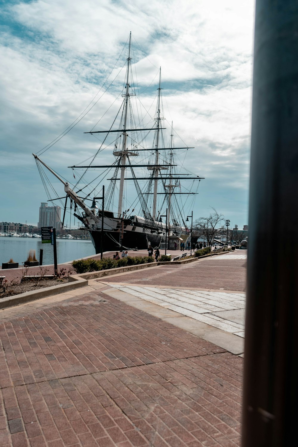 black ship on dock during daytime