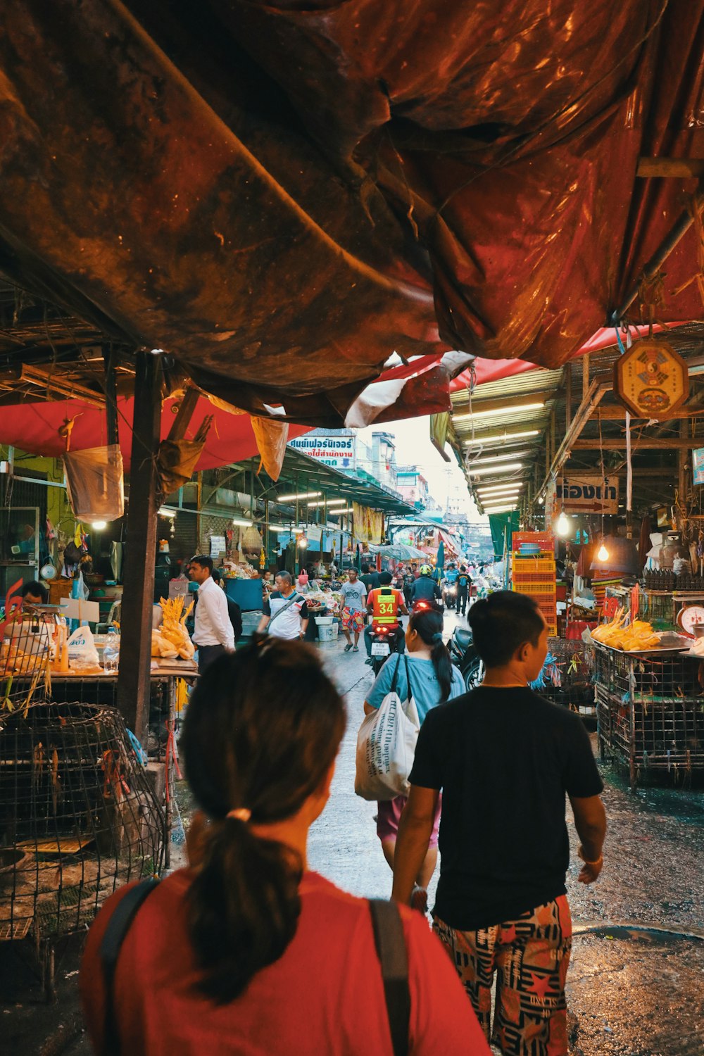 people walking on market during daytime