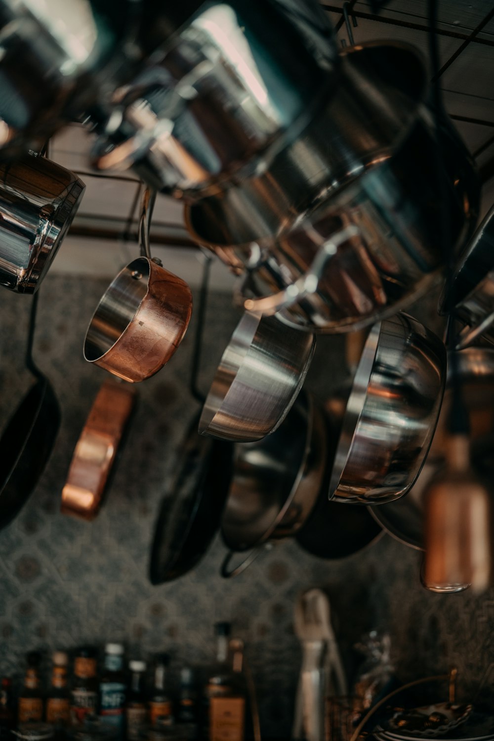 silver and brown steel cooking pots