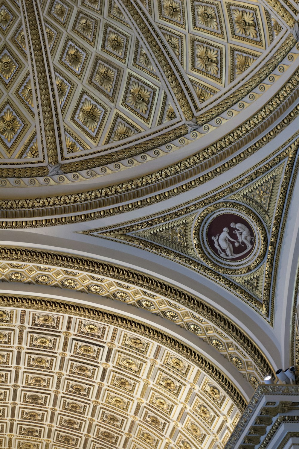 low angle photography of brown and white ceiling